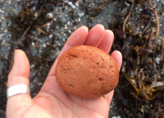 Orange rock on the beach